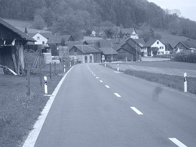Erneuerung der Randabschlüsse und des Asphaltbelags